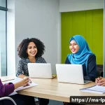 고정관념을 제거하기 위한 피드백 기법 - A diverse group of Malaysian office workers engaged in a collaborative meeting in a modern, well-lit...